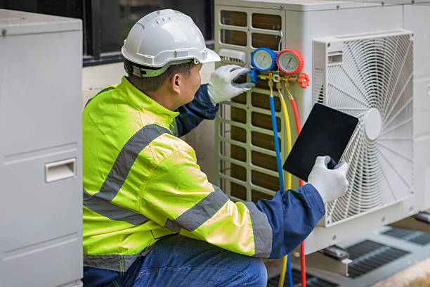 Professional Heat Pump Repair technician working in Shelby, IN